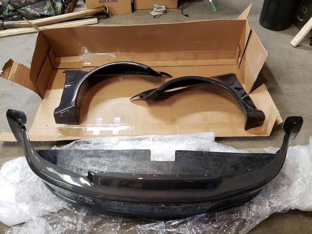 5212943949554119052.jpg Eg couple 3 piece carbon fiber front end Clean !!! New - Image 1