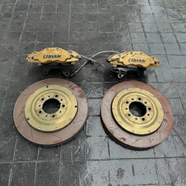 Original Greddy brake 6 Pot with 355 Rotor.