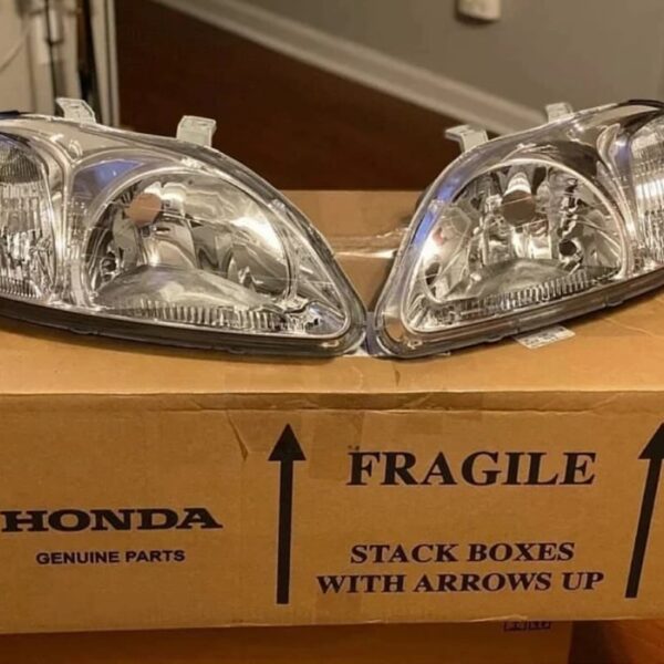 Brand new OEM JDM Stanley 96-98 EK headlights